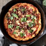 Make this pizza your next night in! The cast iron skillet gives the perfect browning to the crust and makes for an easy clean up! | Mealswithmaggie.com
