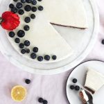 a slice of cheesecake taken out of a pie with a spoon.