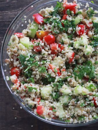 This quinoa lentil salad is a summery blend of fresh vegetables, lentils and cilantro. It is vegan, vegetarian and gluten free! Great for meal prep. #vegan #Vegetarian #glutenfree #coldsalad #mealpreplunches #easymealprep | Mealswithmaggie.com