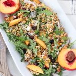 This antioxidant summer salad is filled with sweet peaches, tangy blue cheese, tart dried cherries and nutty walnuts combined with the bite of the red onion makes this salad a joy to eat. Serve this up at your next dinner party | Mealswithmaggie.com #peaches #peachsalad #summerpeachsalad #antioxidants #healthysummerdish #peachrecipes #driedcherries