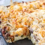 This protein packed breakfast casserole is filled with savory sausage, vegetables and crispy hashbrowns. Perfect for prepping the night before for a tailgate or brunch with friends. | mealswithmaggie.com #proteinpacked #breakfastcasserole #healthybreakfastcasserole #fennel #sausage #hashbrowns #eggcasserole 