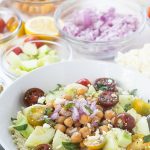 This Greek Orzo Salad is full of fresh, bright ingredients with Middle Eastern spices. A great vegetarian option for meal prep or potluck. | Mealswithmaggie.com #greekorzosalad #mealpreplunch #vegetarian #easygreeksalad  #easypastasalad #pastasalad #greekpastasalad