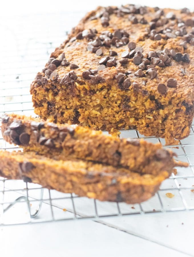 This simple chocolate chip pumpkin oat bread is the perfect addition to your morning coffee. It is soft, chewy and full of fiber. The best part? No fancy ingredients needed. | Mealswithmaggie.com #pumpkinbread #glutenfreebread #highfiber #Oatflour #oatbread #pumpkinchocolatechipbread