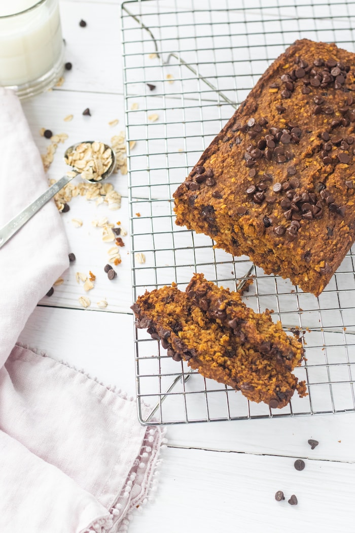 This simple chocolate chip pumpkin oat bread is the perfect addition to your morning coffee. It is soft, chewy and full of fiber. The best part? No fancy ingredients needed. | Mealswithmaggie.com #pumpkinbread #glutenfreebread #highfiber #Oatflour #oatbread #pumpkinchocolatechipbread