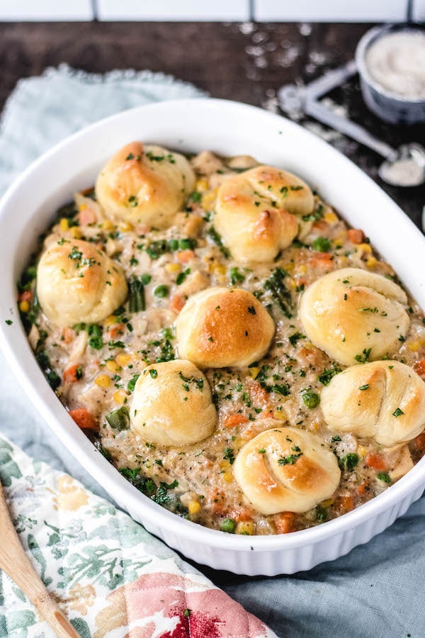 Biscuits in a dish with gravy.