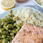 salmon vegetables and rice on a plate