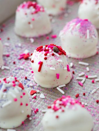 a sugar cookie bite covered in sprinkles.