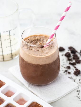 frozen mocha shake with a straw coming out.