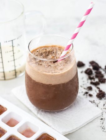 frozen mocha shake with a straw coming out.