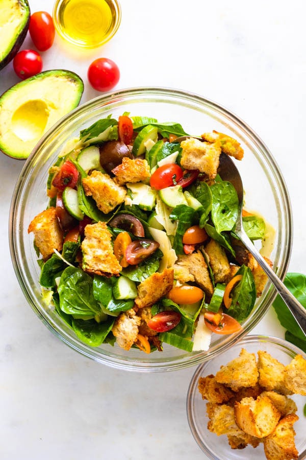 Salad in a bowl with a fork without steak. 