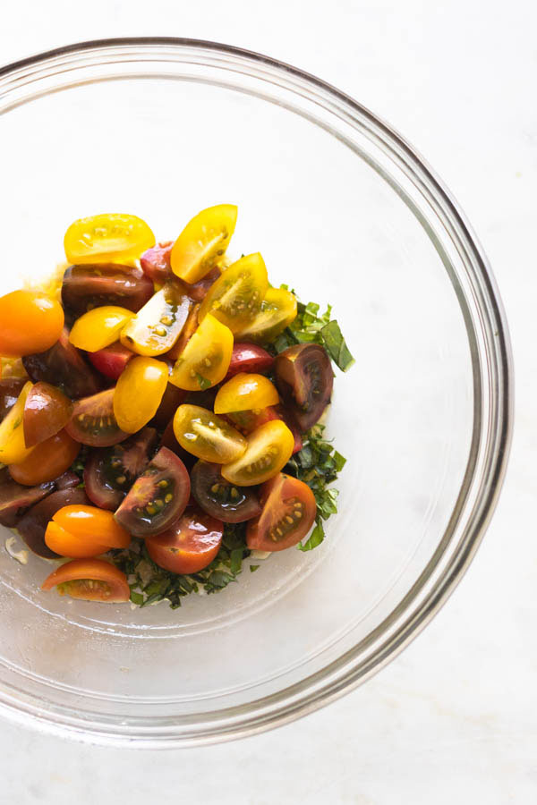 multi colored tomatoes in bowl 