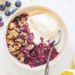 Blueberry crisp with ice cream and oats