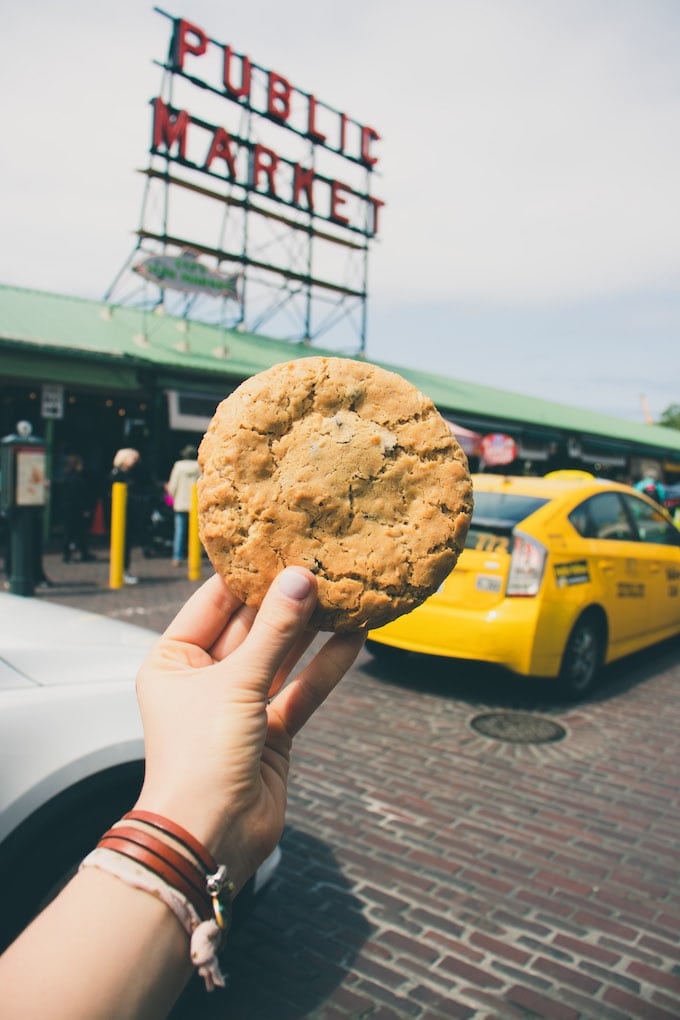 Picture of a cookie with sign in background.