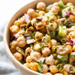 Side view of salad in bowl with mint and chickpeas