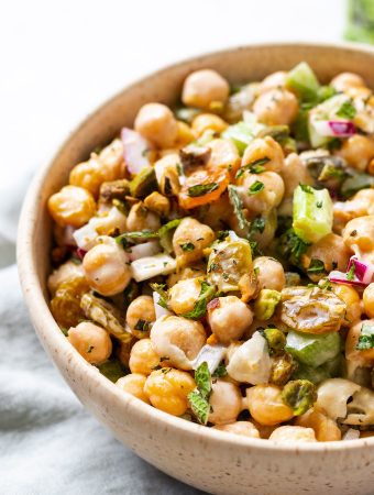 Side view of salad in bowl with mint and chickpeas