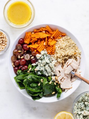 Turkey salad in a bowl with fork in it.