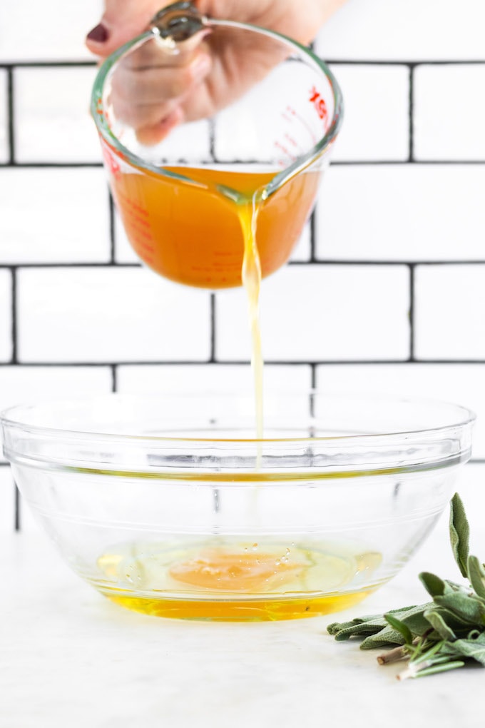 Apple Cider being poured into a bowl. 