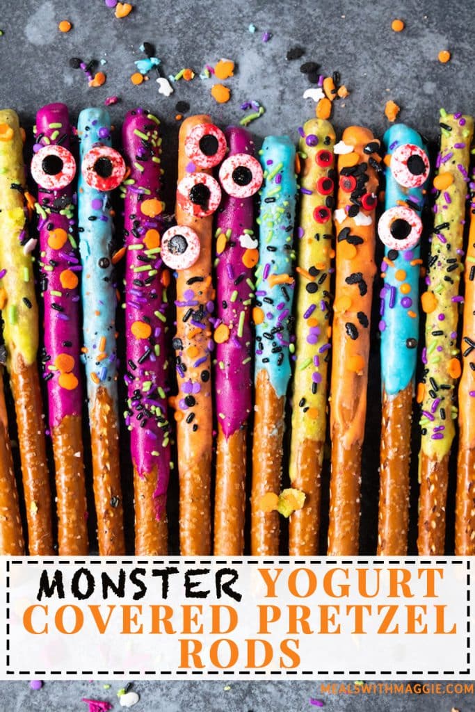 Yogurt covered pretzel rods with sprinkles and eyeballs.