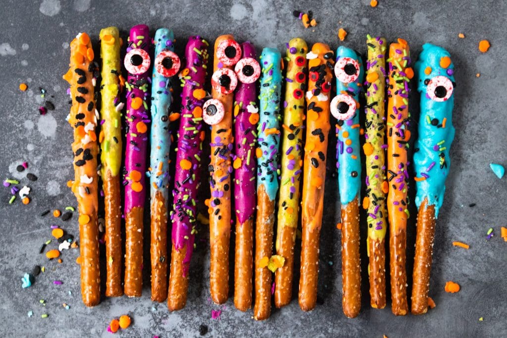 A row of pretzels covered with sprinkles