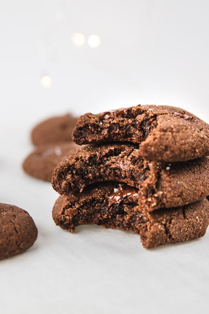 Double chocolate chip cookies with a bite taken out of them.