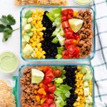 Taco salad in meal prep containers.