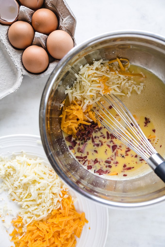 Ingredients in a bowl with a whisk