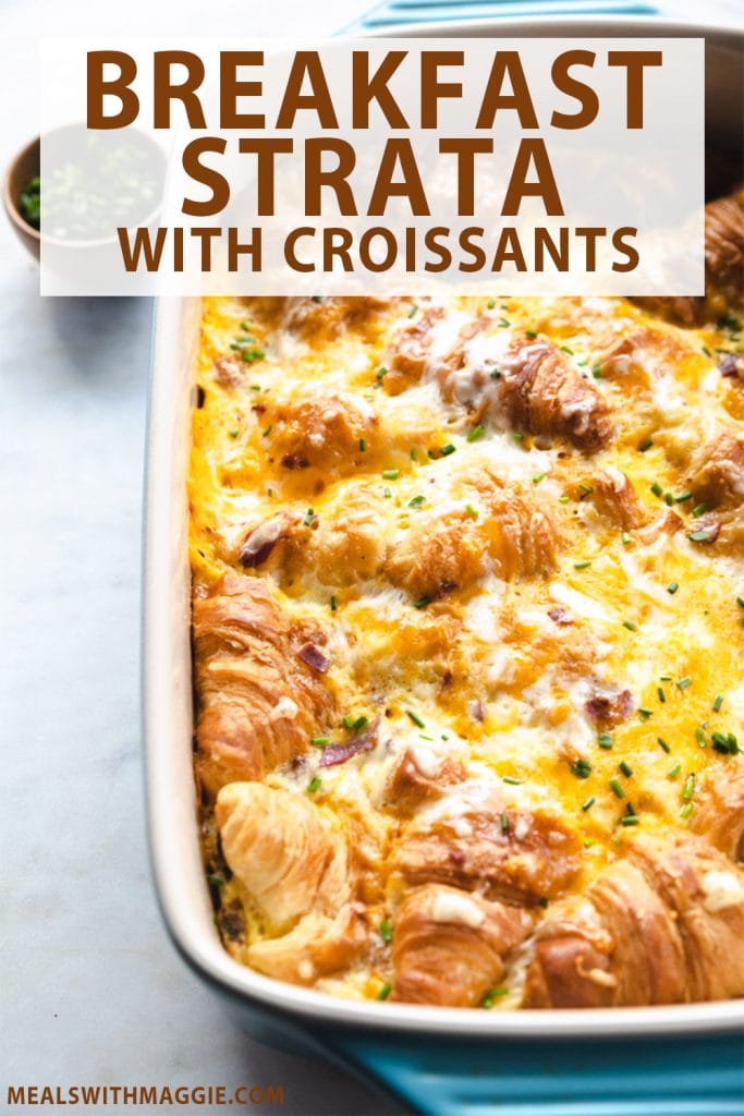 A casserole dish filled with breakfast strata with croissants and text above it.