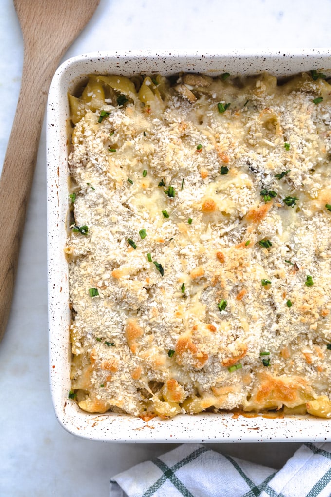 a casserole dish with chives on top. 