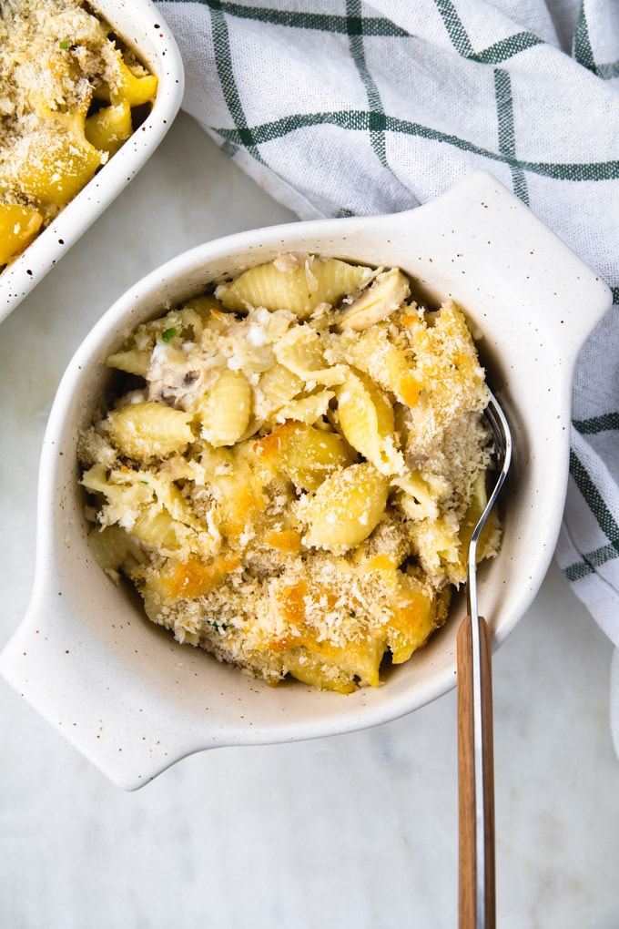 Tuna casserole pasta in a bowl with a fork. 