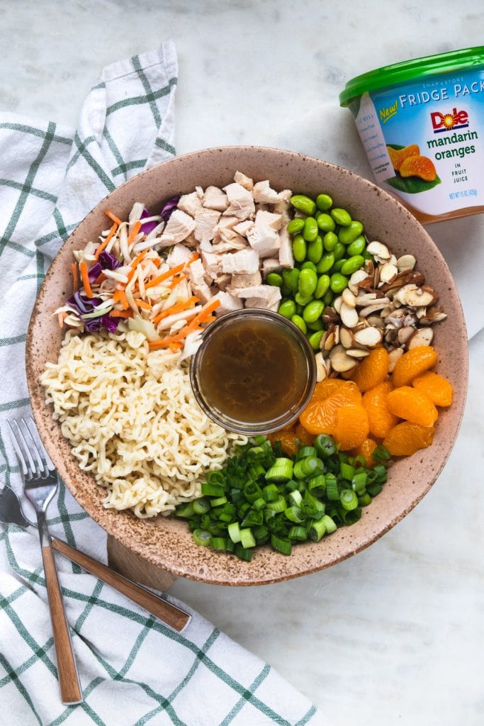 Separated ingredients for salad in a bowl.