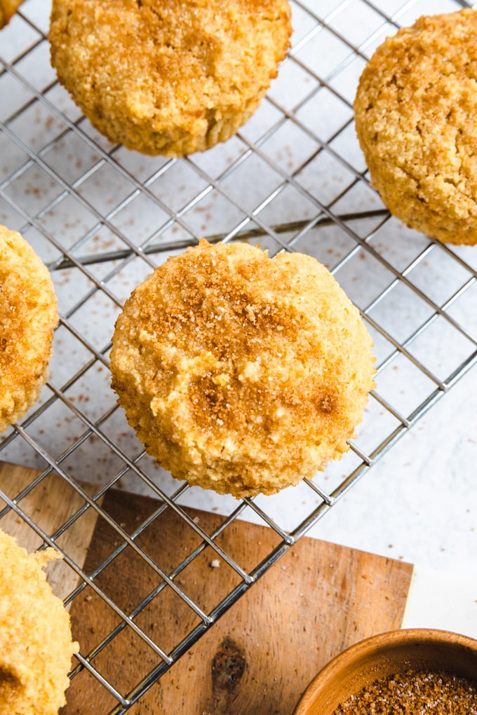 A top view of a muffin with cinnamon sugar on top. 