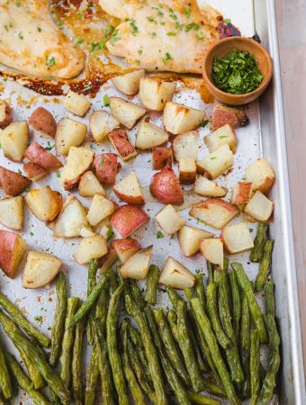 healthy honey mustard chicken on a sheet pan with vegetables