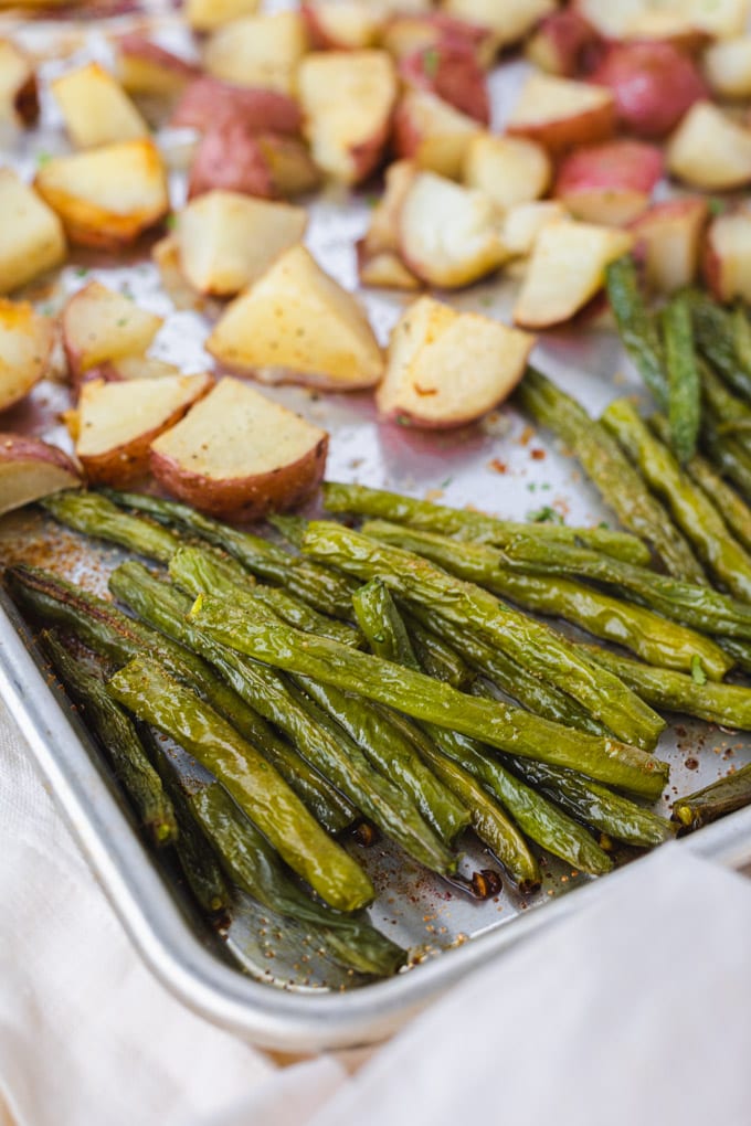 A close up of roasted green beans.