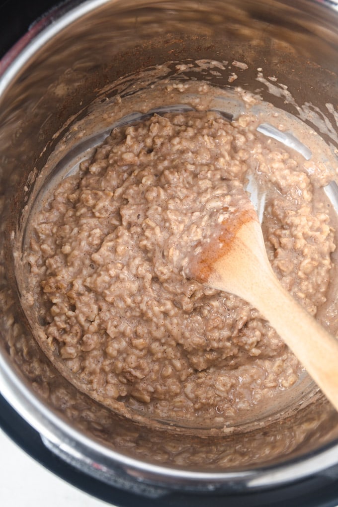 Instant pot filled with cinnamon old fashioned oatmeal.