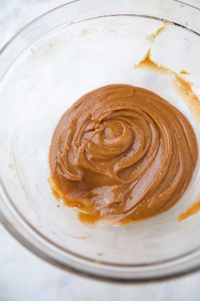 a bowl of peanut sauce. 