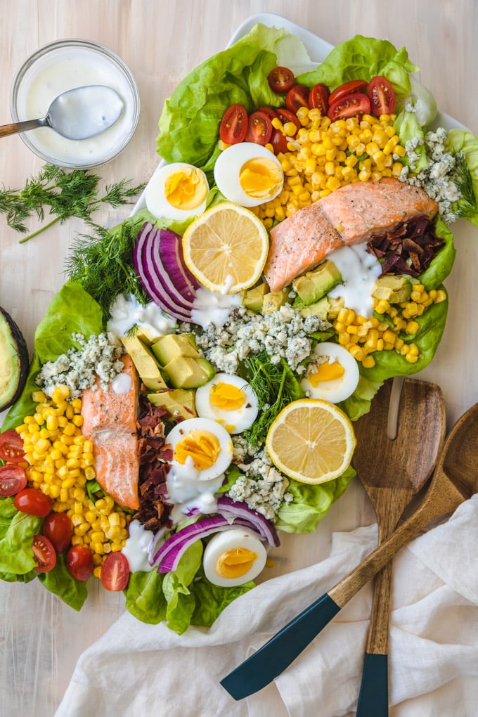 blue cheese yogurt dressing on salmon salad