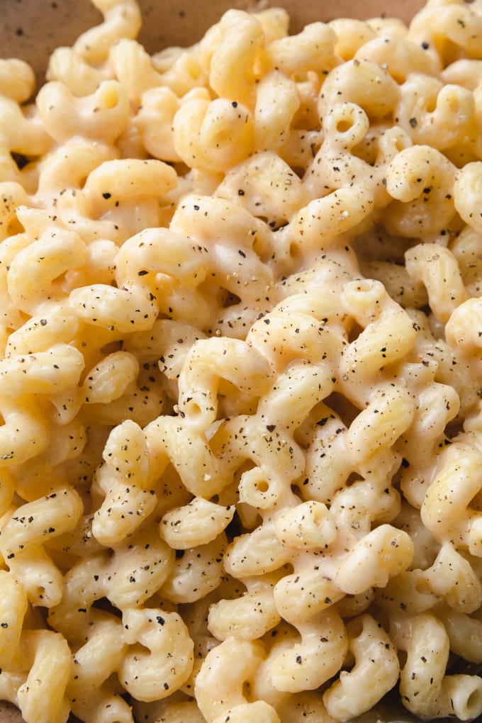 black pepper on noodles with cheese.