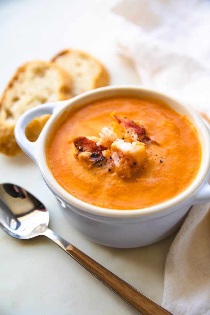 cracked pepper on top of lobster in a healthier bisque soup.