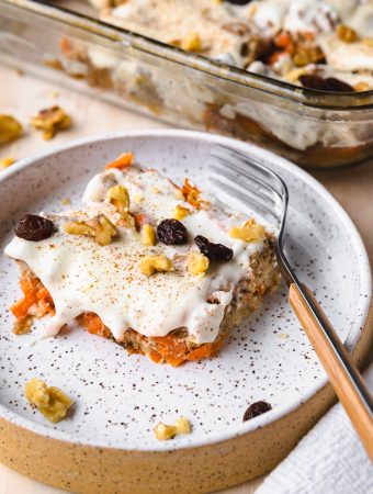 a piece of bread pudding on a plate with a fork