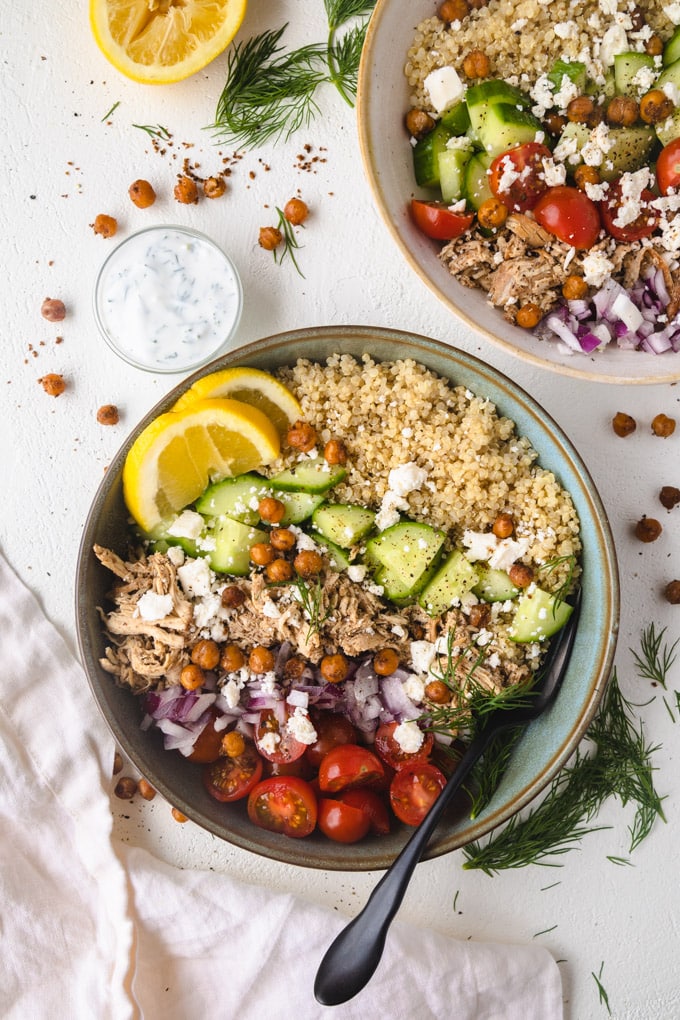 two bowls of ingredients with toppings.