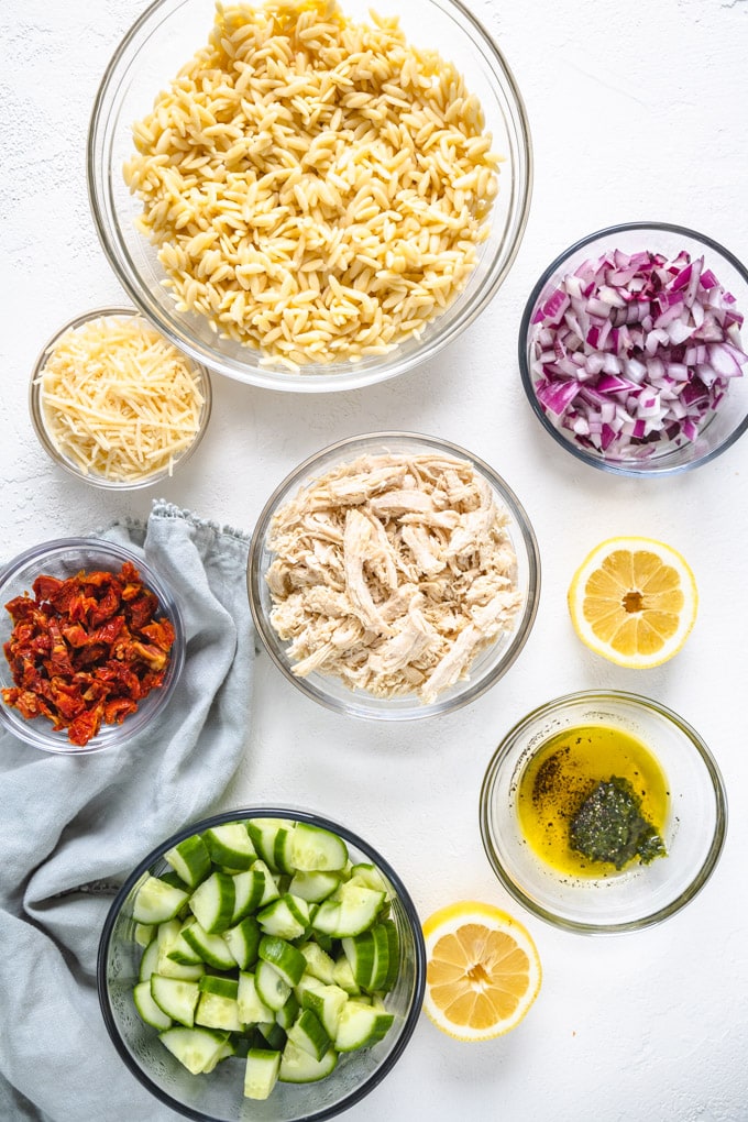 ingredients for chicken pasta salad in bowls