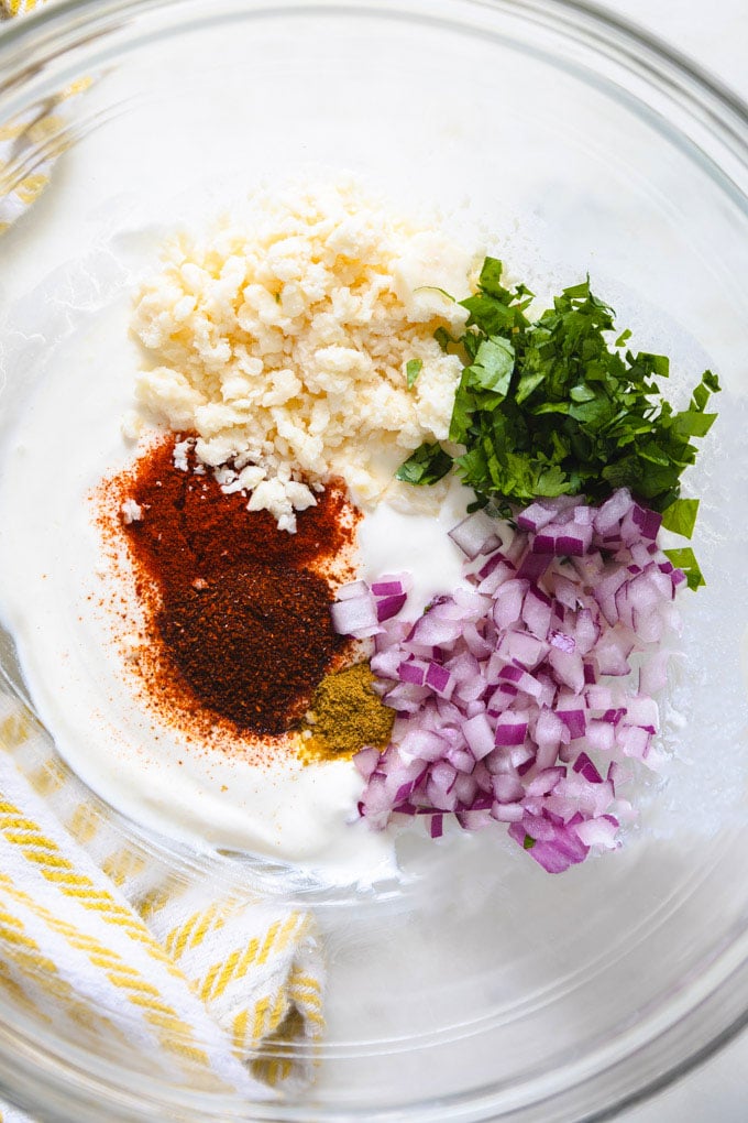 Ingredients for elote dip in a bowl.