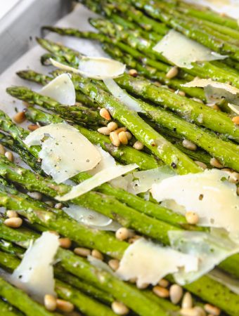 Asparagus on a sheet pan with parmesan and lemon