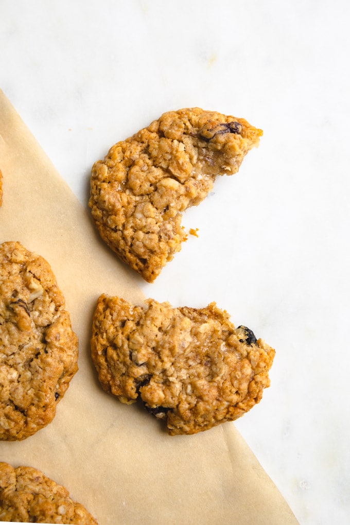 a chewy oatmeal cookie broken in half. 