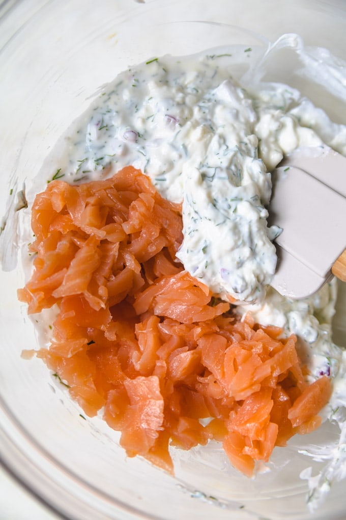 smoked salmon in a bowl with a spatula. 