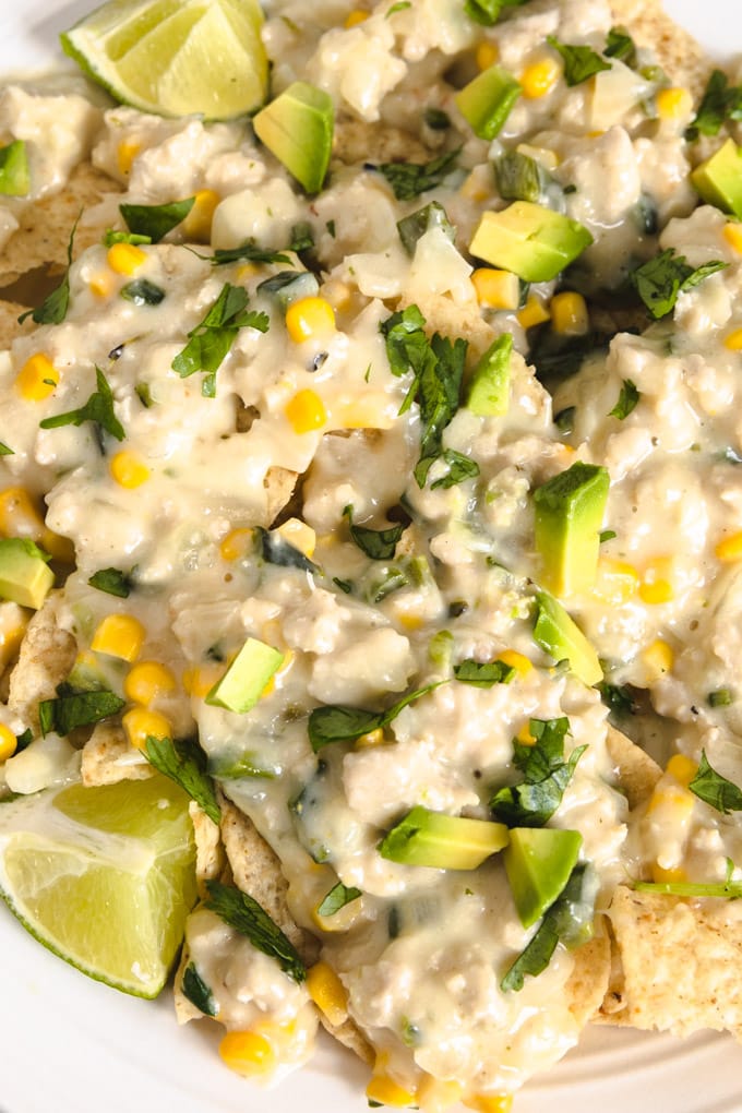 skillet dinner over tortilla chips with lime and cilantro.