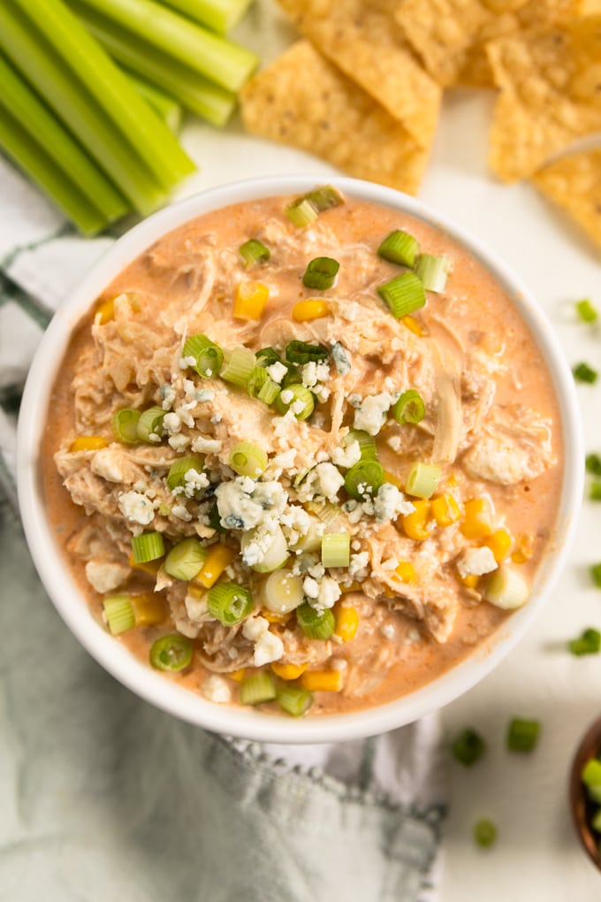 buffalo chicken dip with blue cheese and scallions on top. 